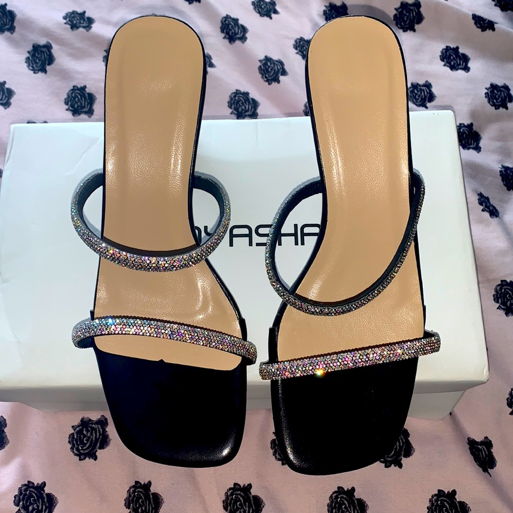 Small heel/ Size 6.5/ Color Black with rime stone’s